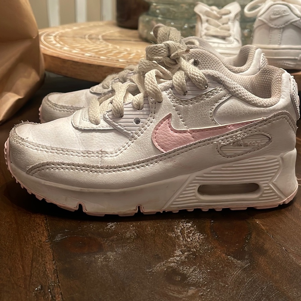 Nike Kids White Sneakers with Pink Swoosh Accent